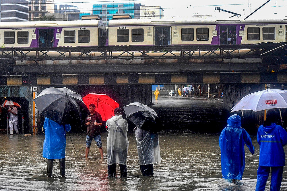| Photo: PTI : Waterlogging at Andheri subway